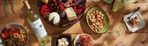 Lifestyle photography with food and wine on a table